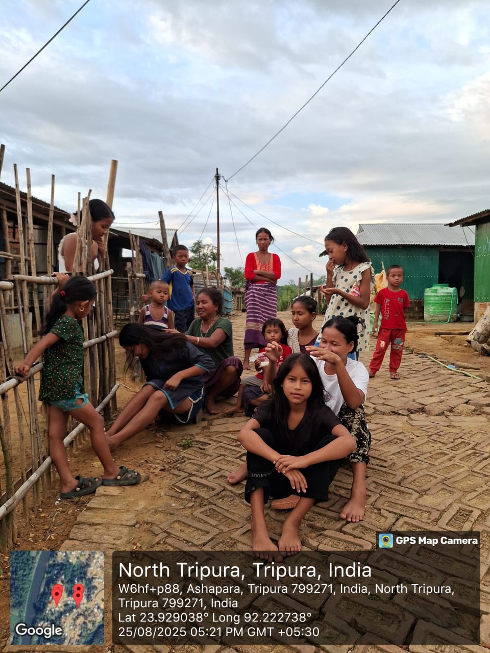 Residents gathered along a lane in Ashapara, North Tripura, during the 2025 field assessment